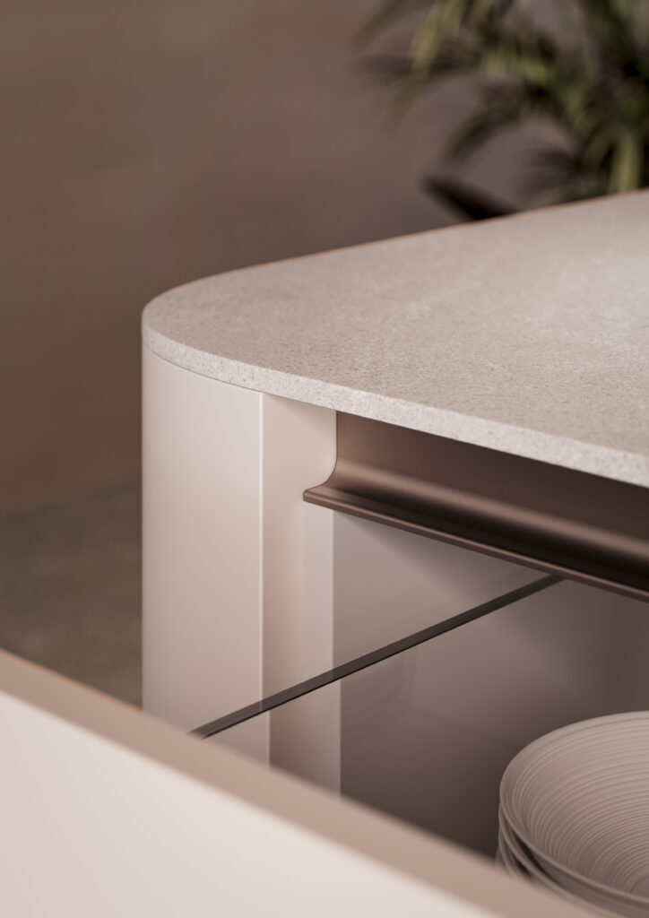 Stone worktop with a rounded edge above an open drawer
